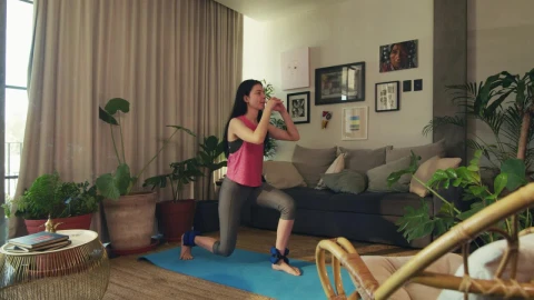 Free Stock Video Woman Exercising In Her Living Room Live Wallpaper - St patrick Wallpaper