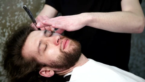 Stock Footage Trimming A Beard With A Razor Live Wallpaper animated wallpaper preview