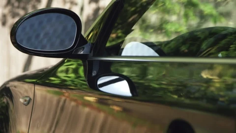 Stock Footage Trees Reflecting On A Parked Car Live Wallpaper animated wallpaper preview