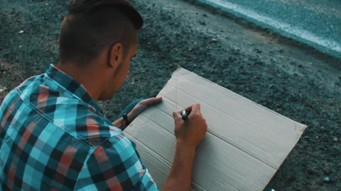 Stock Footage Writing On A Cardboard Sign Live Wallpaper Free animated wallpaper preview