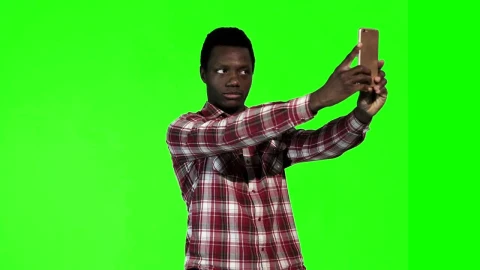 Stock Footage Young Man Doing A Selfie On A Green Screen Live Wallpaper Free animated wallpaper preview
