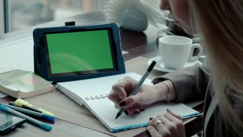 Stock Footage Writing A Note On A Notebook And Using Tablet Live Wallpaper Free - Wallpaper Wallpaper