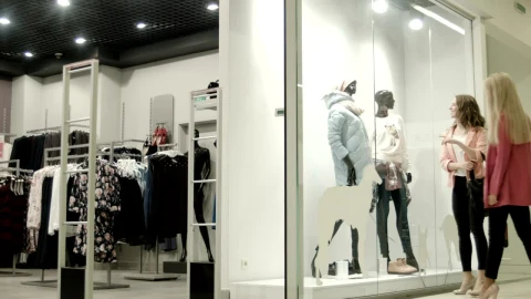 Stock Footage Women Entering The Clothing Store In The Mall Live Wallpaper Free - Wallpaper Wallpaper