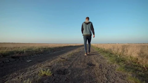 Stock Footage Young Man Walking In A Rural Path Live Wallpaper Free - Wallpaper Wallpaper