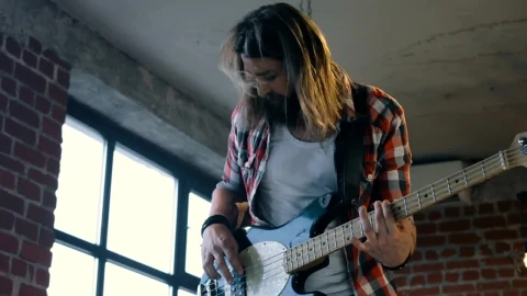Stock Footage Young Man Playing Bass Guitar Live Wallpaper Free animated wallpaper preview