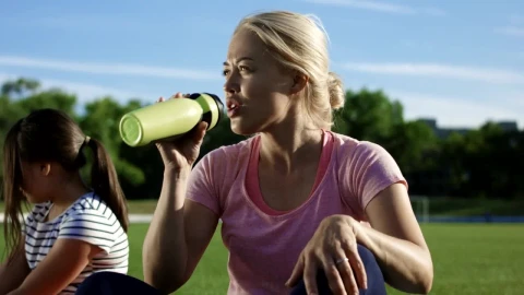 Stock Footage Woman Drinking Water After Exercising Live Wallpaper Free - Wallpaper Wallpaper