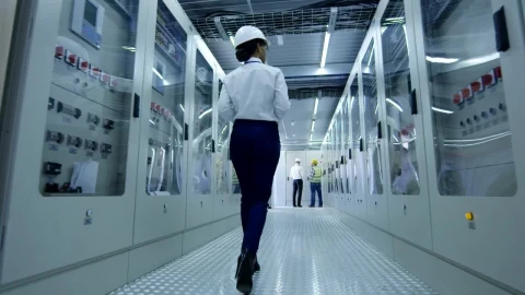 Stock Footage Woman With Helmet Walking In A Factory Hallway Live Wallpaper Free - Wallpaper Wallpaper