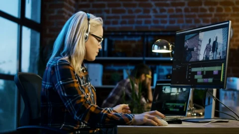 Stock Footage Woman Doing Video Editing With Headphones Live Wallpaper Free - Wallpaper Wallpaper
