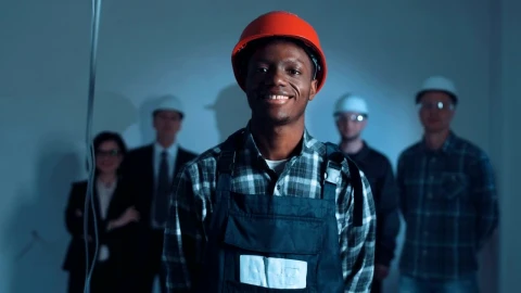Stock Footage Young Construction Worker Posing With Helmet Live Wallpaper Free - Wallpaper Wallpaper