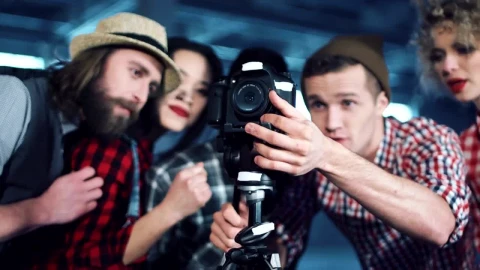 Stock Footage Young People Watching Display Camera Live Wallpaper Free animated wallpaper preview