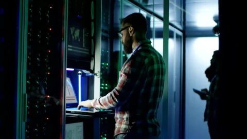 Stock Footage Young Engineers Working On Server Room Live Wallpaper Free - Wallpaper Wallpaper