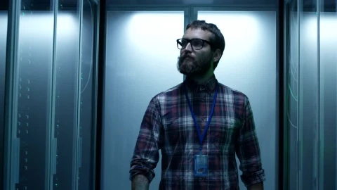 Stock Footage Young It Specialist Working On A Server Room Live Wallpaper Free - Wallpaper Wallpaper