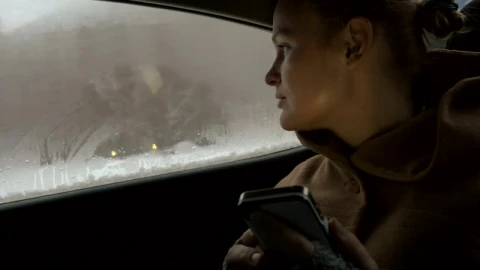 Stock Footage Woman Holding Her Phone In The Car Live Wallpaper Free - Wallpaper Wallpaper