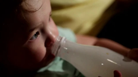 Stock Footage Young Child Drinking From A Bottle Live Wallpaper Free - Wallpaper Wallpaper