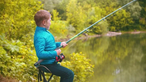 Stock Footage Young Boy With A Fishing Rod At The Lake Live Wallpaper Free - Wallpaper Wallpaper