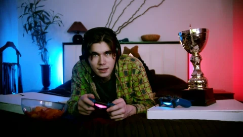 Stock Footage Young Gamer Man Chatting While Playing Live Wallpaper Free animated wallpaper preview