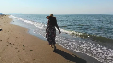 Stock Footage Woman With A Hat Walking On An Empty Beach Live Wallpaper Free - Wallpaper Wallpaper