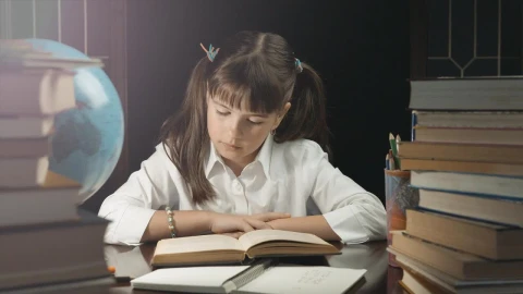 Stock Footage Young Girl Learns From Book In Dark Room Live Wallpaper Free - Wallpaper Wallpaper