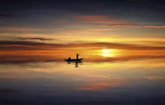 Two Guys In A Boat And Sunset Animated Desktop Background