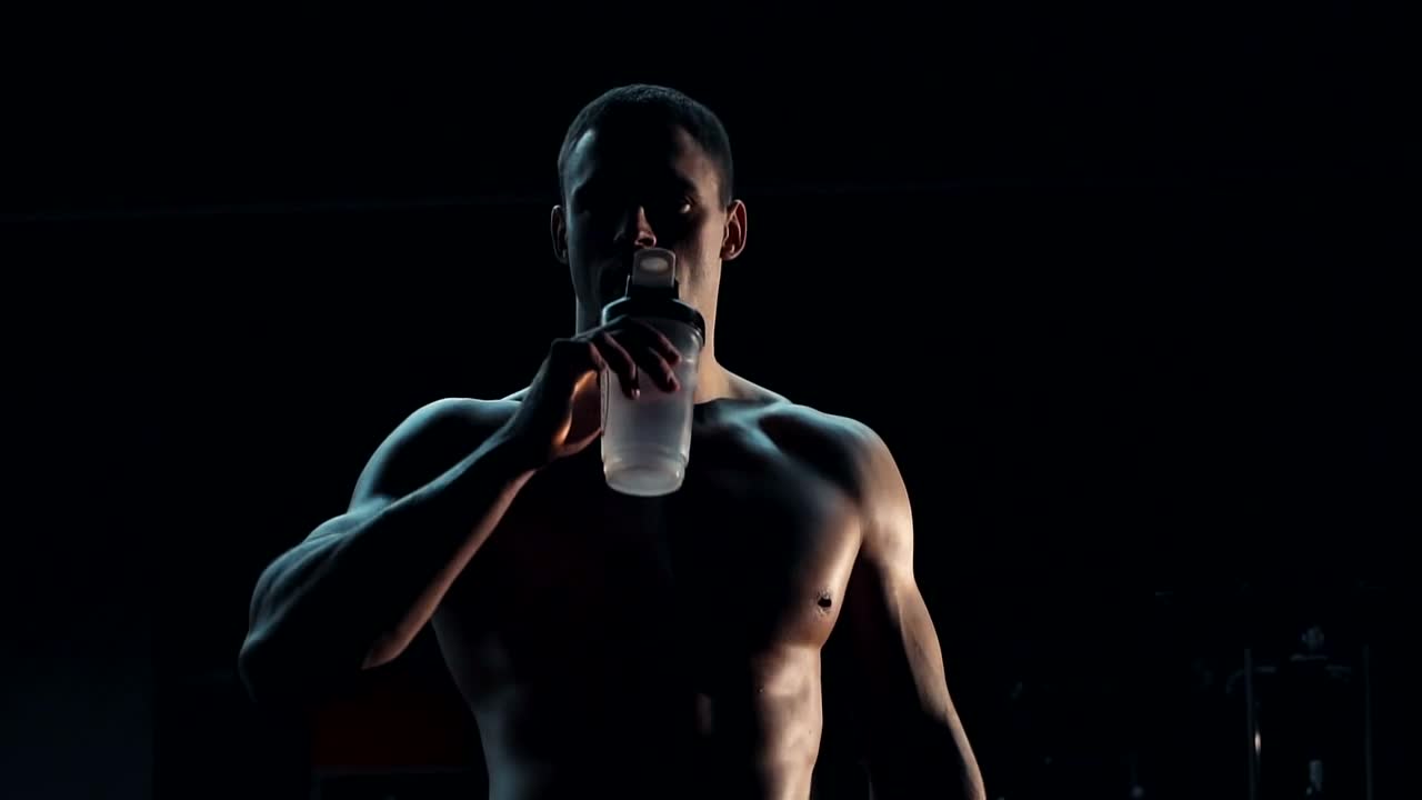 Download Stock Video A Bodybuilder Is Drinking Water Live Wallpaper for PC