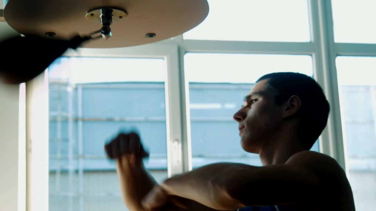 Download Stock Video A Boxer Hitting The Speed Punching Bag Live Wallpaper for PC