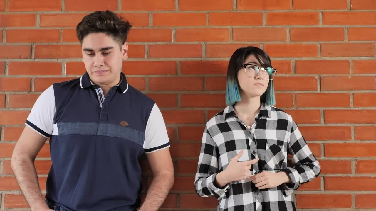 Download Stock Video A Boy And A Girl Turning Around In Shame Live Wallpaper for PC