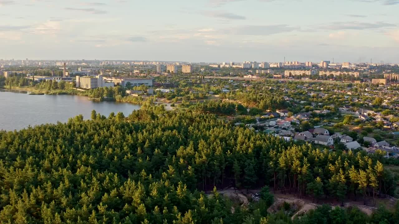 Download Stock Video A City By A Forest And A Lake Aerial Shot Live Wallpaper for PC