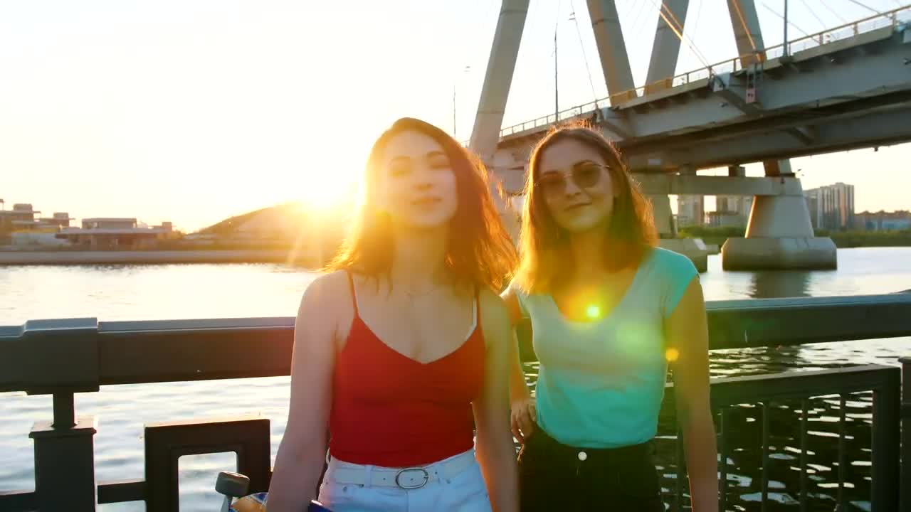 Download Stock Video A Couple Of Girls Smiling At The Camera Live Wallpaper for PC