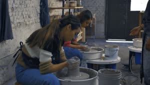Stock Video A Couple Of Girls During A Pottery Class Live Wallpaper for PC