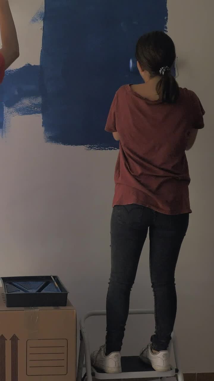 Download Stock Video A Couple Painting A Wall Blue Live Wallpaper for PC