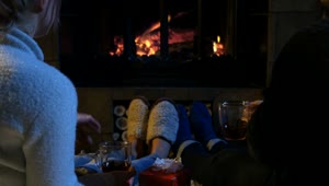 Stock Video A Couple Relaxing In Front Of A Chimney Live Wallpaper for PC