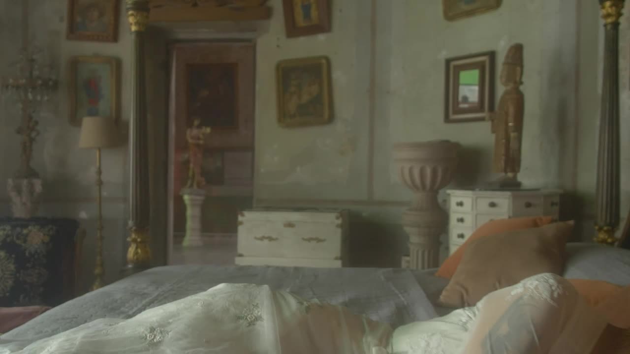 Download Stock Video A Depressed Old Fashioned Woman Laying In Bed Live Wallpaper for PC
