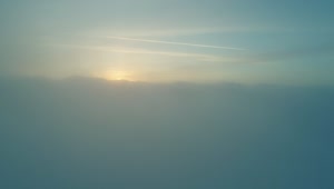 Stock Video Above The Huge Clouds That Cover The Sun Live Wallpaper for PC