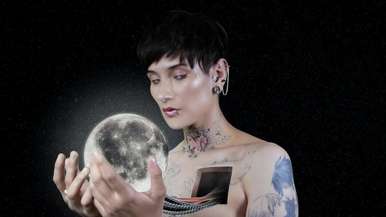 Download Stock Video Abstract Video Of A Woman Holding The Moon In Her Live Wallpaper for PC