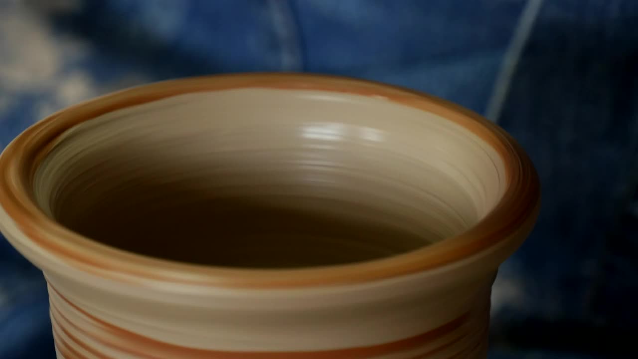 Download Stock Video Adding Color To A Clay Vase Live Wallpaper for PC