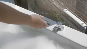 Stock Video Adding Hot Water To A Bath Live Wallpaper for PC