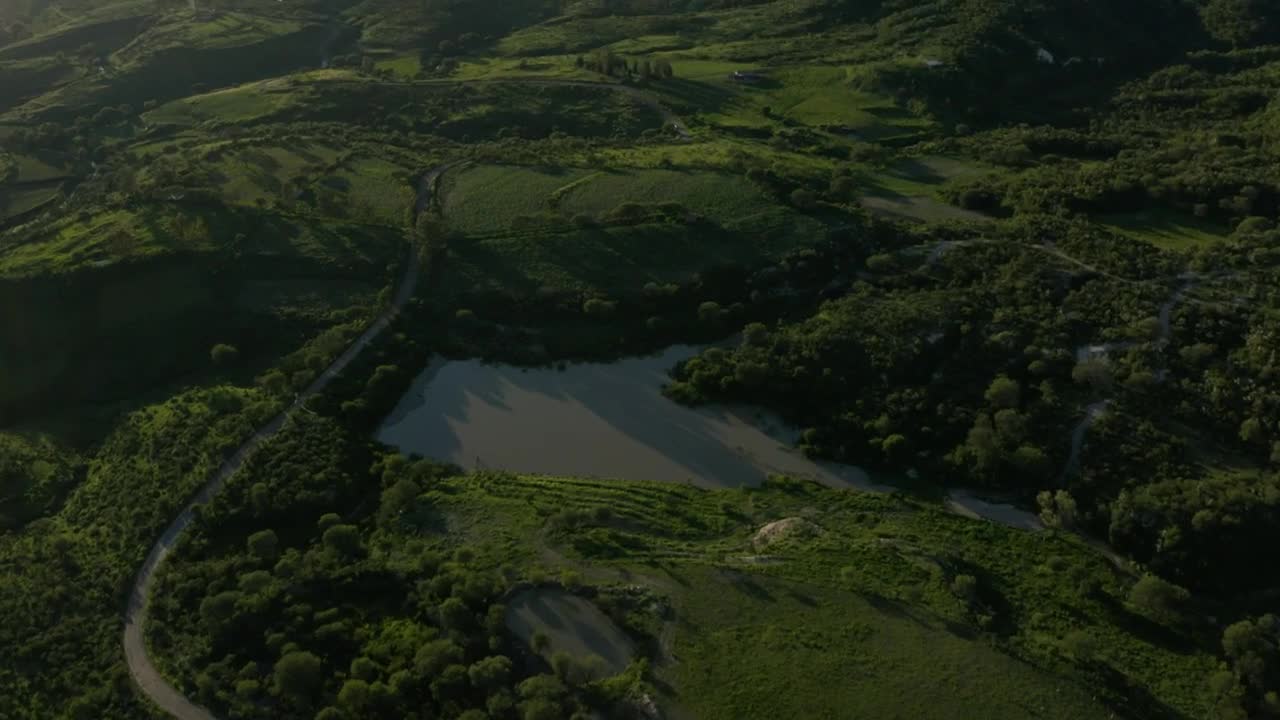 Download Stock Video Aerial Look At A Natural Landscape On A Sunny Day Live Wallpaper for PC