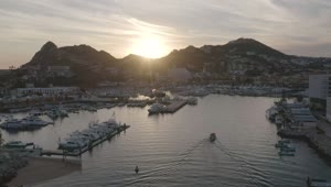 Stock Video Aerial Panorama Of A Tourist Port At Sunset Live Wallpaper for PC