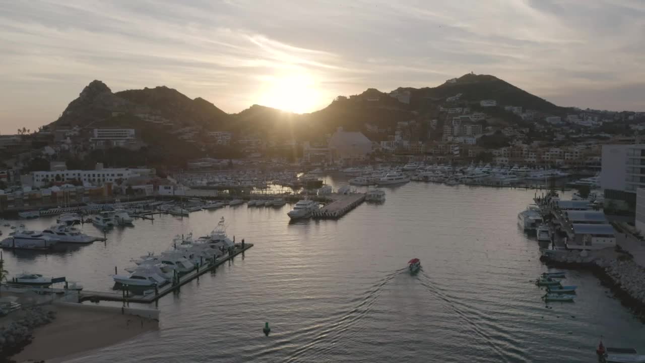 Download Stock Video Aerial Panorama Of A Tourist Port At Sunset Live Wallpaper for PC