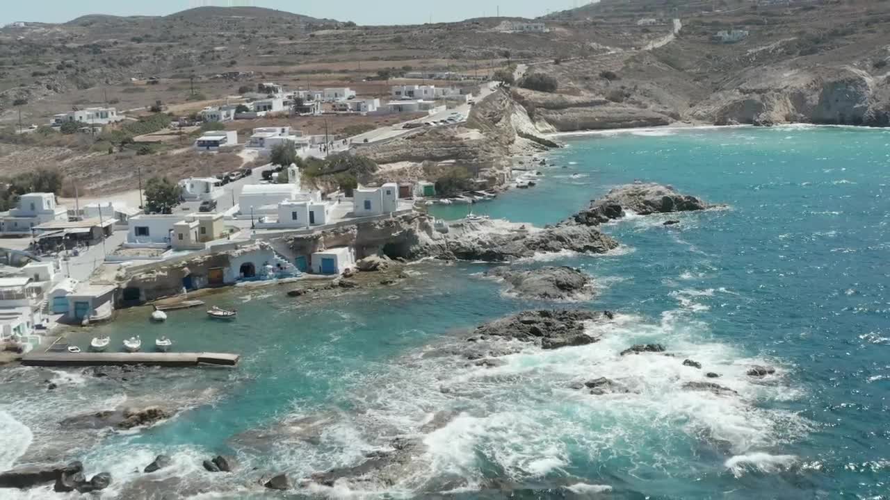 Download Stock Video Aerial Shot Of A Port Village Seen From The Sea Live Wallpaper for PC