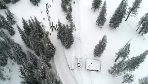 Stock Video Aerial Shot Of A Ski Station With People Practicing Live Wallpaper for PC