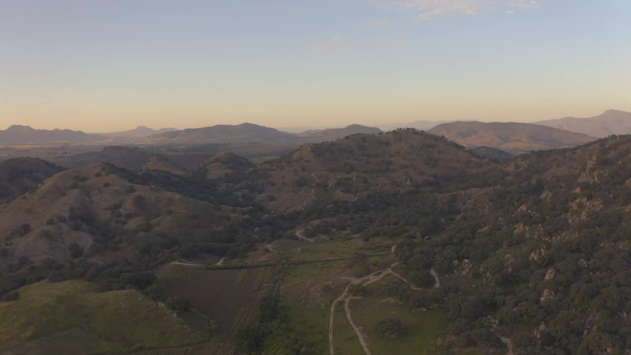 Download Stock Video Aerial Shot Of A Tree Covered Mountain Range Live Wallpaper for PC