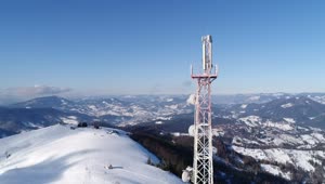 Stock Video Aerial Shot Of An Ice Covered Communications Tower Live Wallpaper for PC