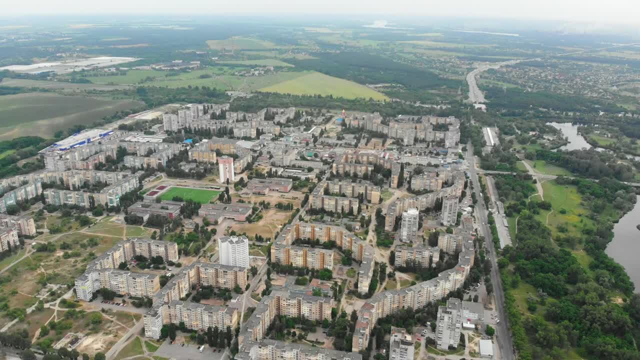 Download Stock Video Aerial Shot Of Buildings Near A River Live Wallpaper for PC