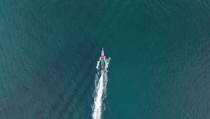 Stock Video Aerial Tracking Shot Of A Boat In The Sea Live Wallpaper for PC