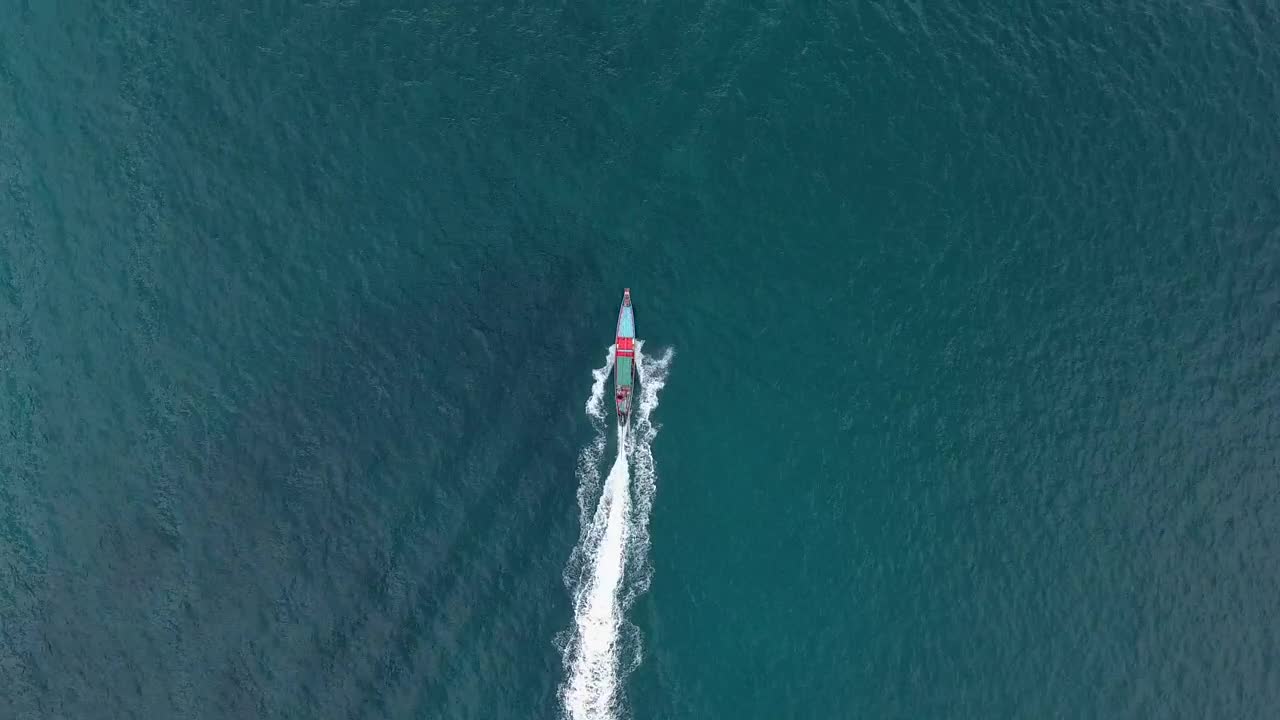 Download Stock Video Aerial Tracking Shot Of A Boat In The Sea Live Wallpaper for PC