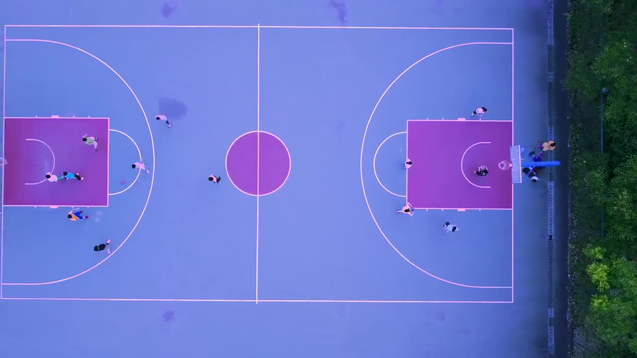 Stock Video Aerial View Of A Blue And Purple Basketball Court Live