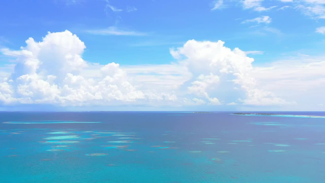 Download Stock Video Aerial View Of A Blue Sea With Big Clouds Live Wallpaper for PC