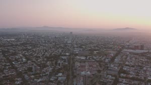 Stock Video Aerial View Of A City During The Sunrise Live Wallpaper for PC