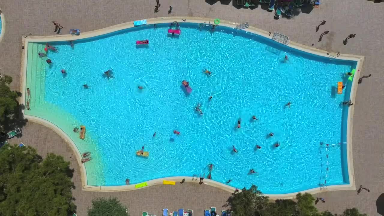 Download Stock Video Aerial View Of A Crowded Swimming Pool Live Wallpaper for PC